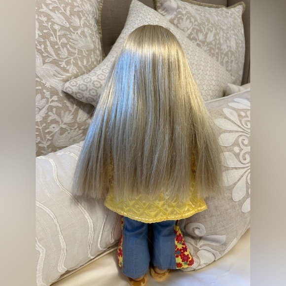 A Gently Used 18" American Girl Julie™ doll with warm brown eyes and blonde hair - Picture 2 of 6